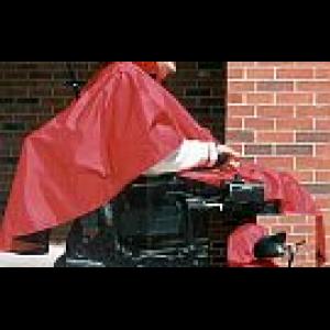 rain poncho with removable fleece liner and option of zippers for power chair headrest opening